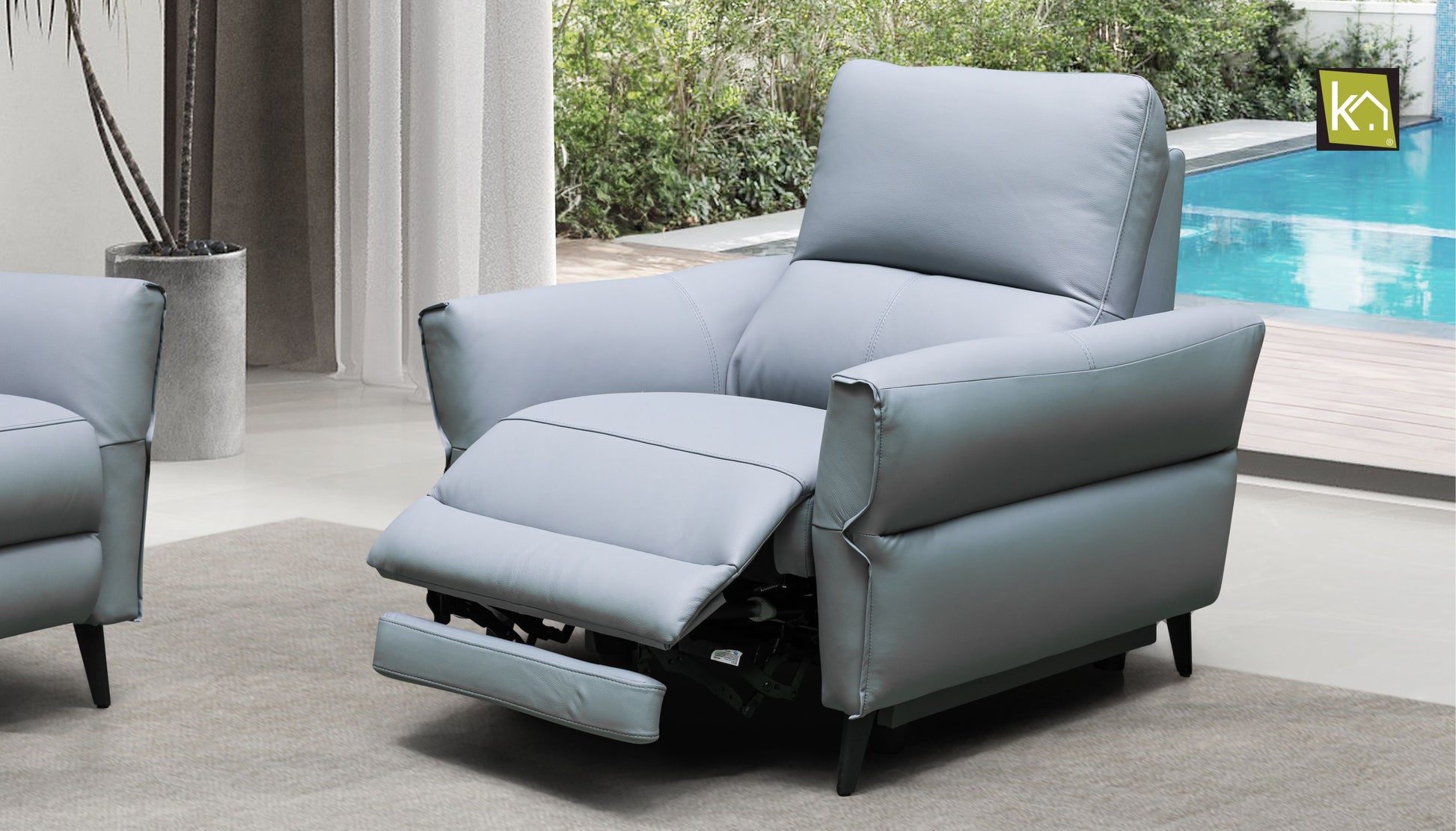 blue-gray reclining armchair with footrest extended