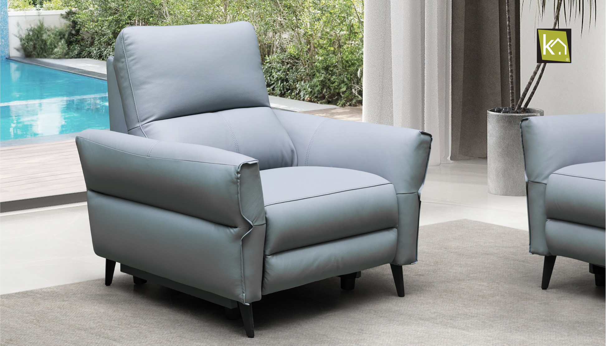 blue-gray reclining chair in a living room arrangement